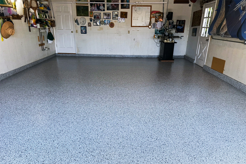 Concrete restoration contractor near Malibu CA has applied new sealant for garage floor.